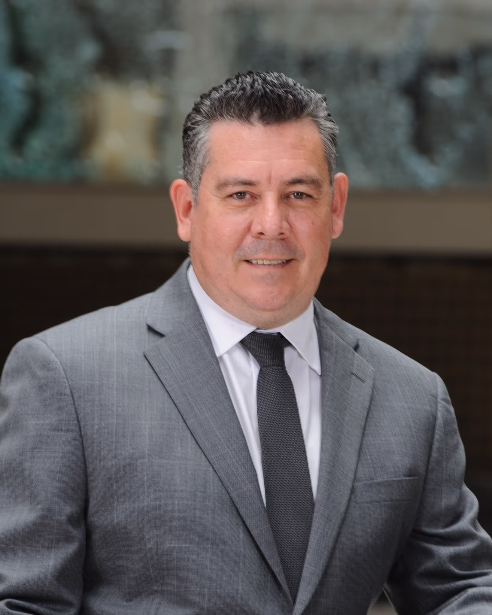 Dr. Chris Ardueser, DBA